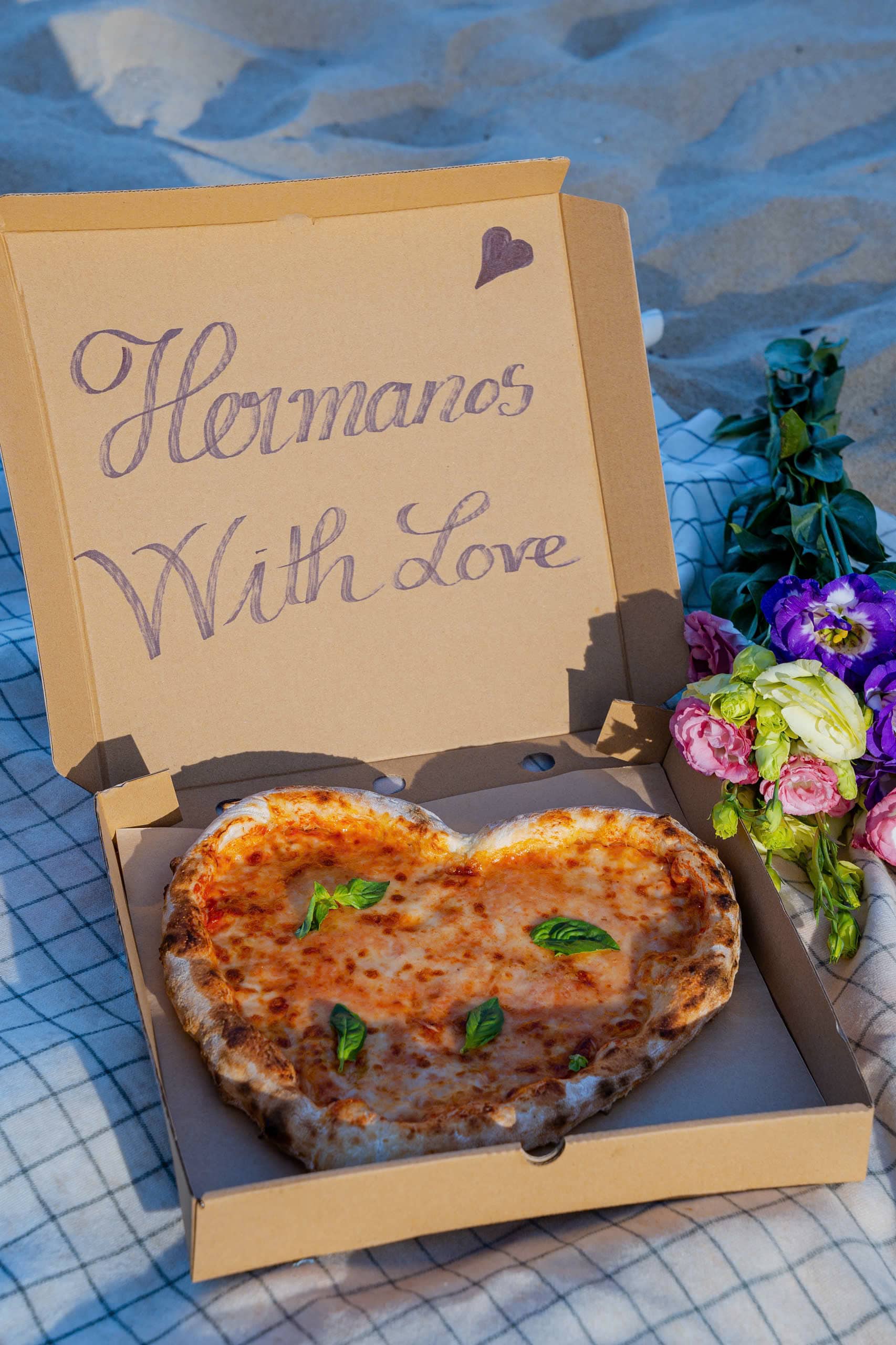 Freshly baked pizza at Hermanos