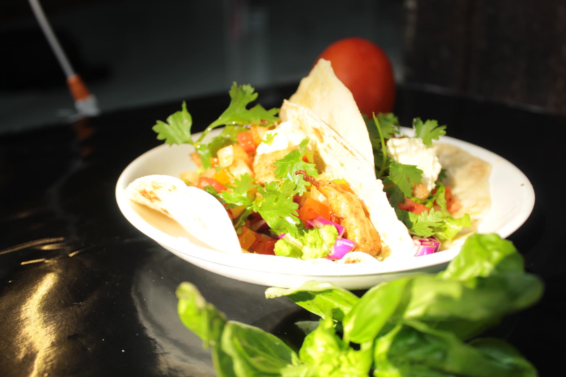 Fresh tacos with herbs and colorful vegetables